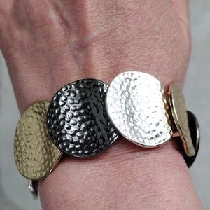 Beautiful tri color medallions stretch fit bracelet.